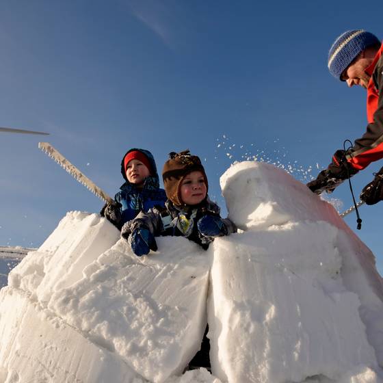 Building an igloo in fresh snow