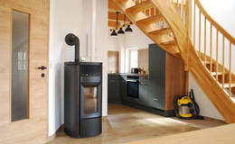 Fireplace and kitchen in the Schirgi vacation home