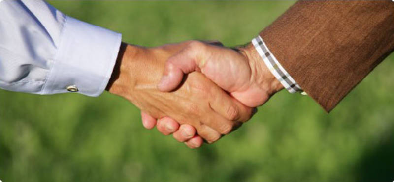 The handshake is a symbol of mountain pasture farming