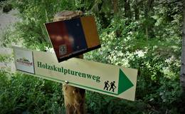 Wooden sculpture path Signposts