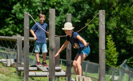 Child balancing on the adventure station