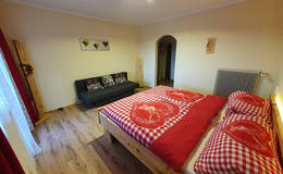 Bedroom with sofa bed in the vacation home