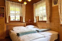 Quaint bedroom in the Naintschbauer vacation home.
