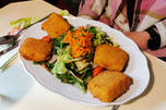 Kreuzwirt baked cheese on salad