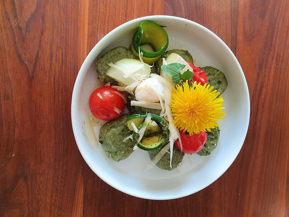 Dandelion gnocchi dish